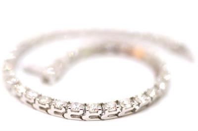 Zlatý náramek s diamanty