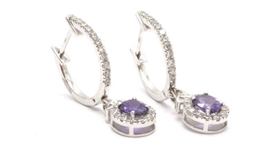 Zlaté náušnice s diamanty a safíry