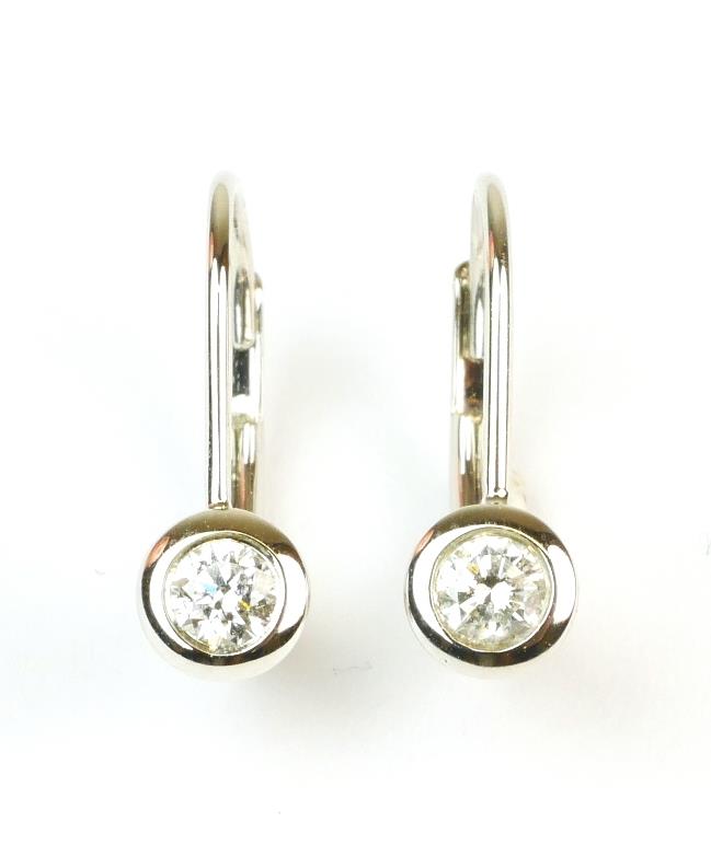 Zlaté náušnice s diamanty