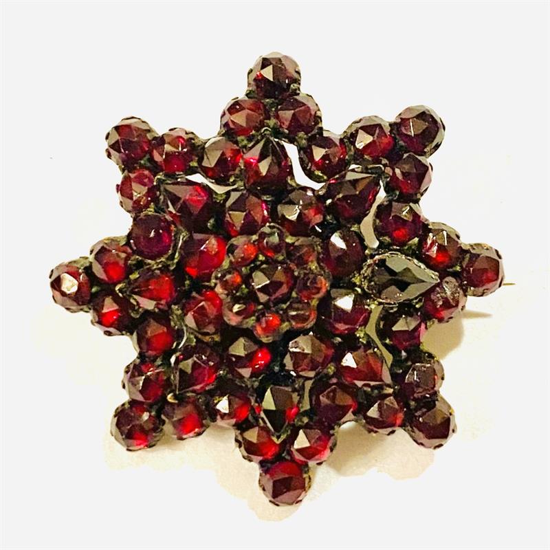 Starožitná brož "hvězda" s českými granáty