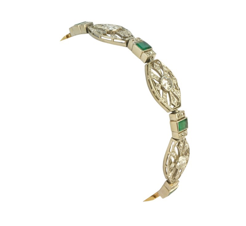 Platninovo-zlatý náramek s brilianty a smaragdy