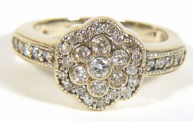 Zlatý prsten s brilianty 0,65 ct