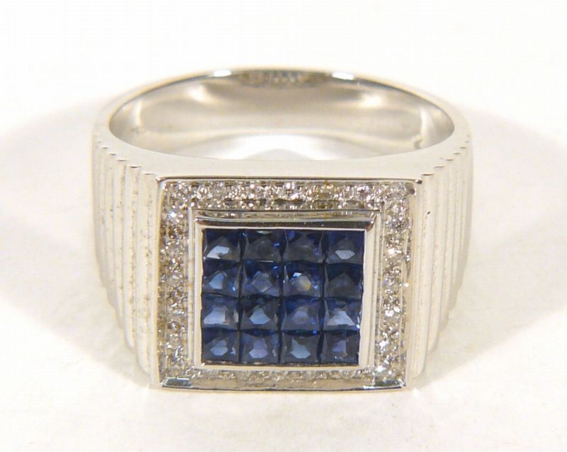 Zlatý prsten s brilianty a safíry