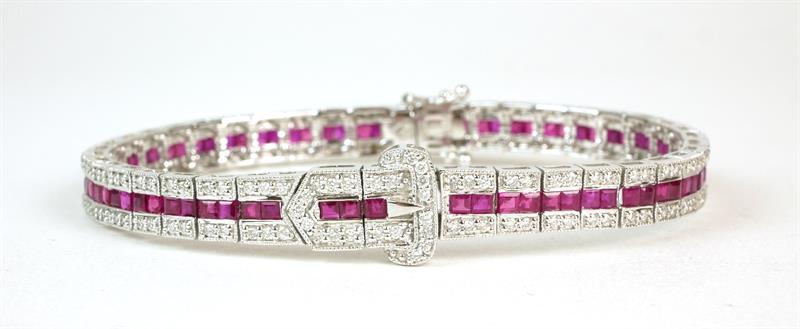 Zlatý náramek s brilianty a rubíny