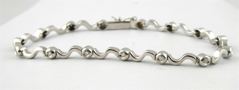 Náramek z bílého zlata a diamanty