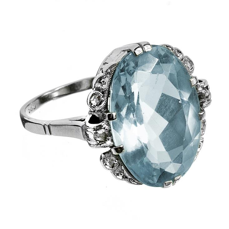 Zlatý prsten s akvamarínem a routami