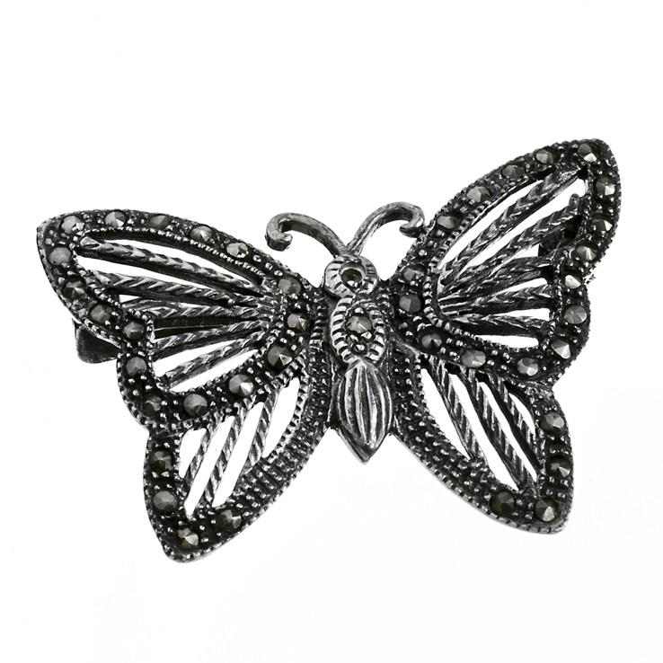 Stříbrná brož s markazity