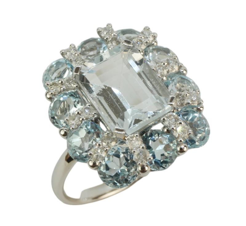 Zlatý prsten s akvamarínem, topazy a brilianty