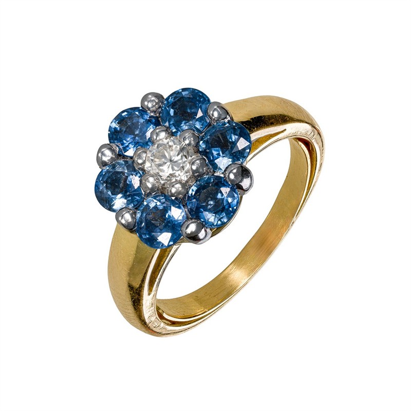 Zlatý prsten s přírodním diamantem a přírodními safíry