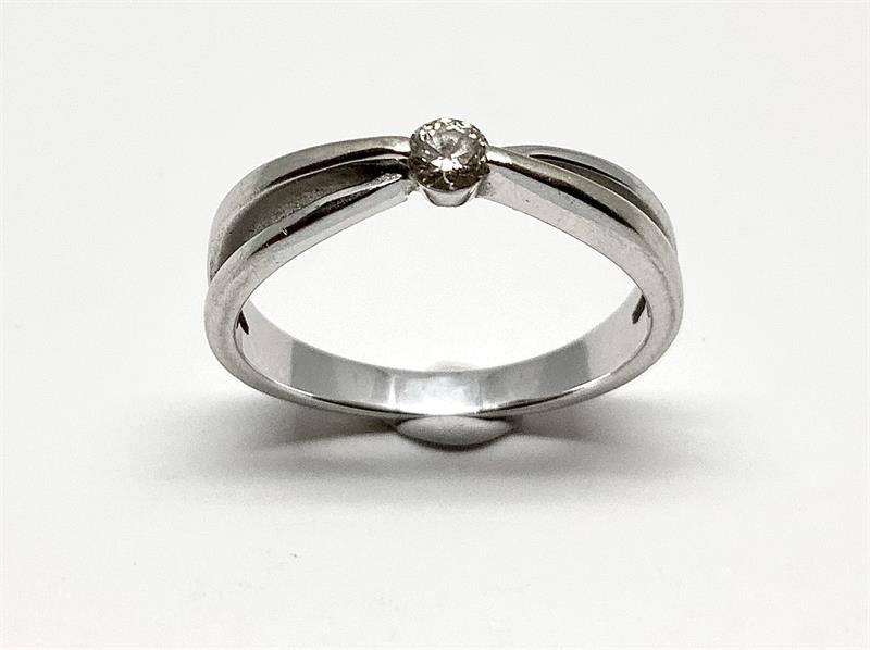 Prsten z bílého zlata s briliantem