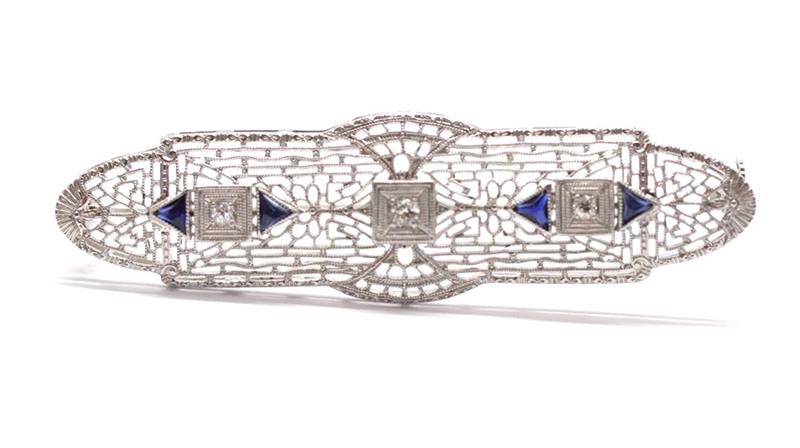 Zlatá brož s diamanty a safíry