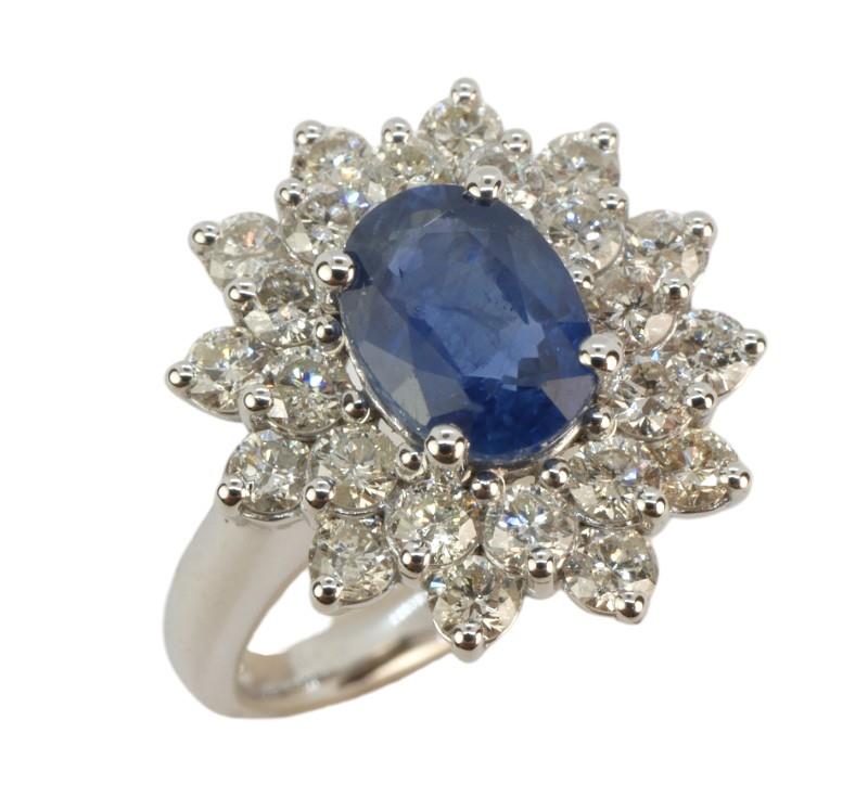 Zlatý prsten se safírem a brilianty