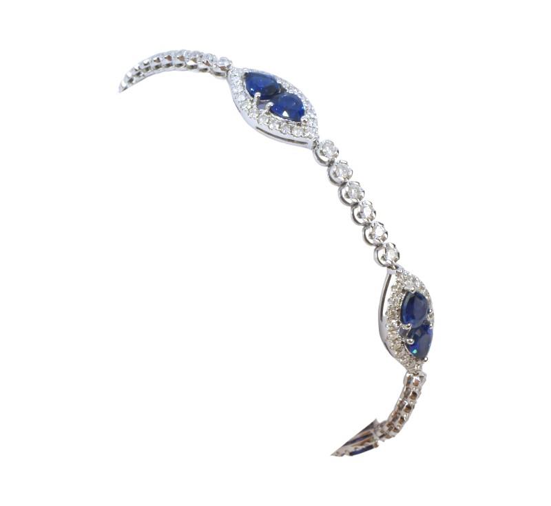 Zlatý náramek se safíry a brilianty