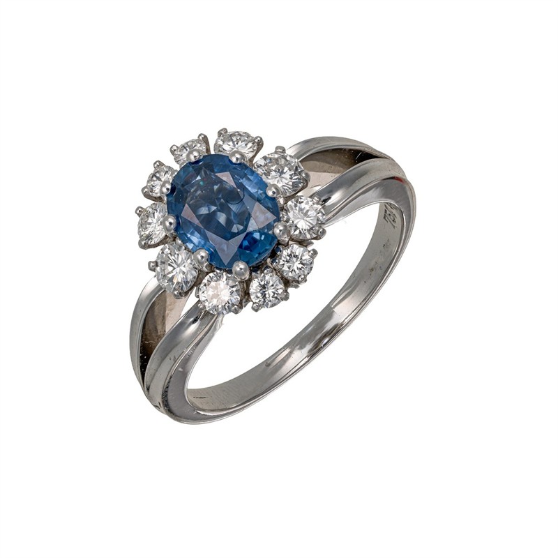 Zlatý prsten s přírodním safírem a přírodními diamanty