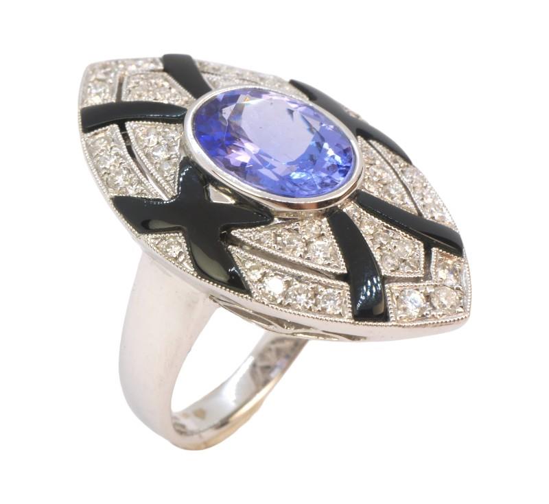 Zlatý prsten s tanzanitem, brilianty a onyxy