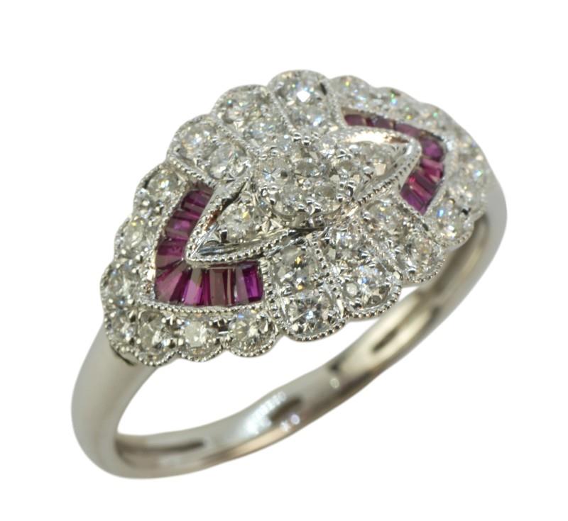 Zlatý prsten s brilianty a rubíny