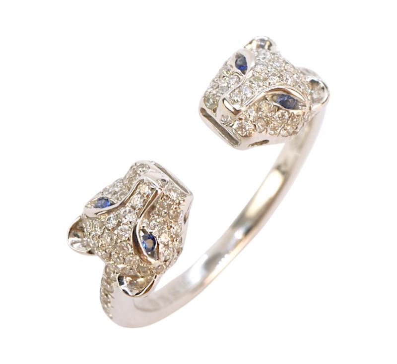 Zlatý prsten s brilianty a safíry