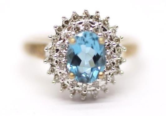 Zlatý prsten s diamanty a topazem