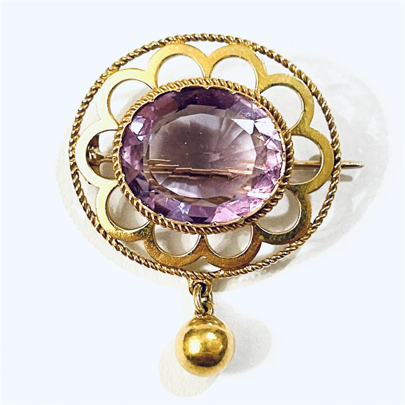 Zlatá starožitná brož s ametystem