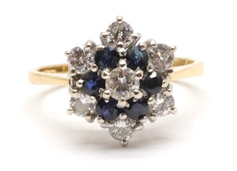 Zlatý prsten s diamanty a safíry