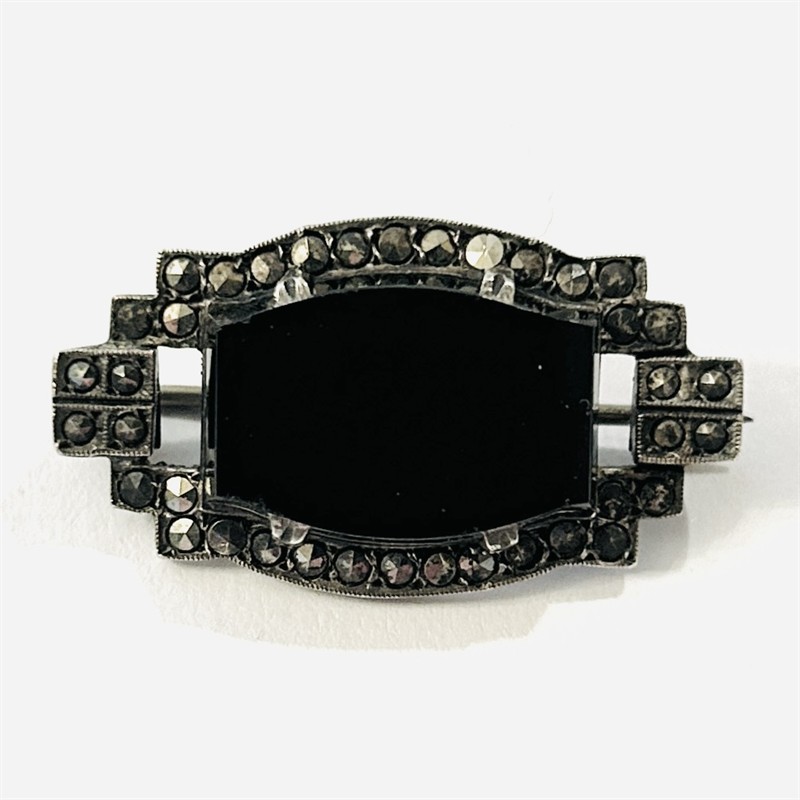 Stříbrná art-deco brož s černým onyxem a markazity