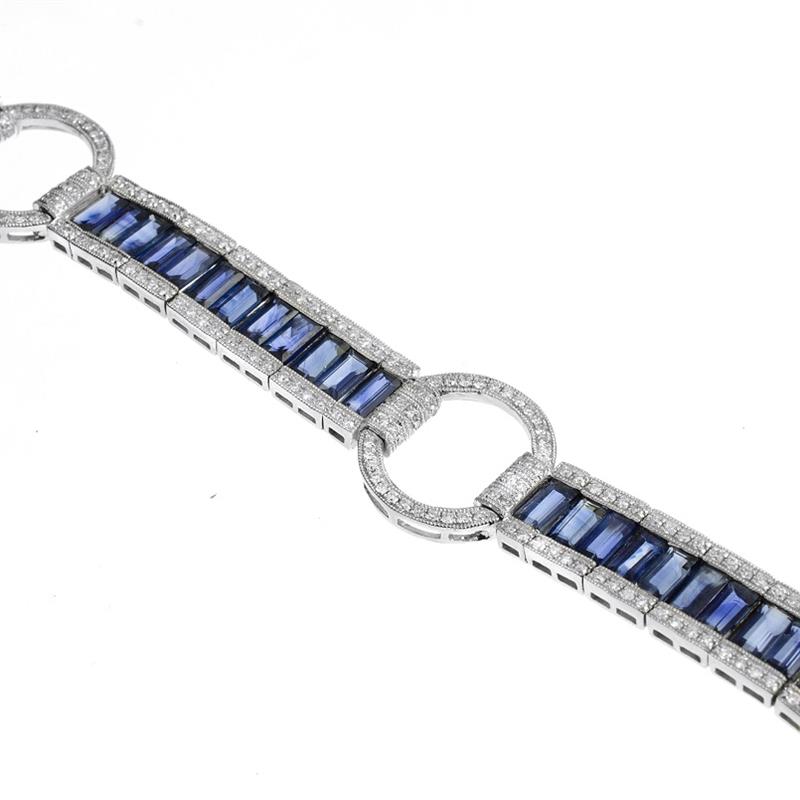 Zlatý náramek s brilianty a safíry