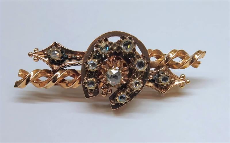 Zlatá brož s diamanty