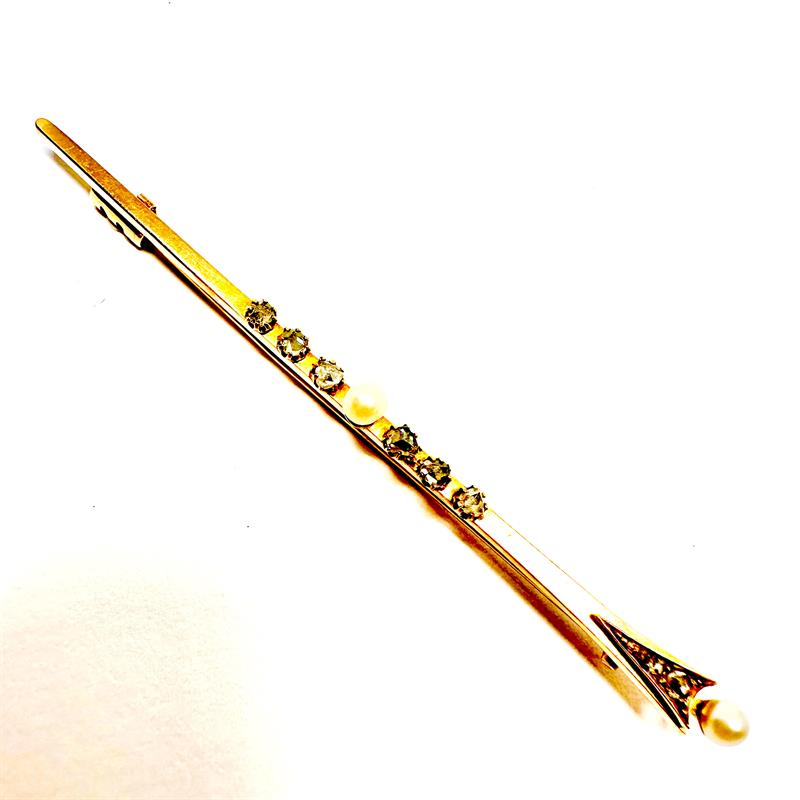 Dlouhá zlatá brož s diamantovými routami