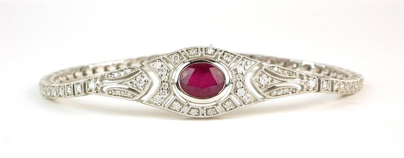 Zlatý náramek s brilianty a rubínem