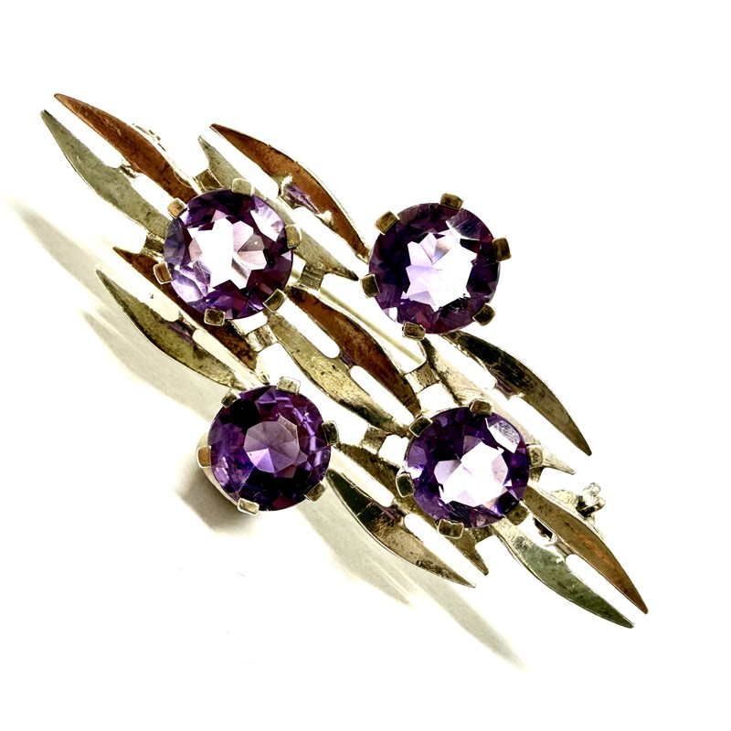 Stříbrná designová brož s ametysty