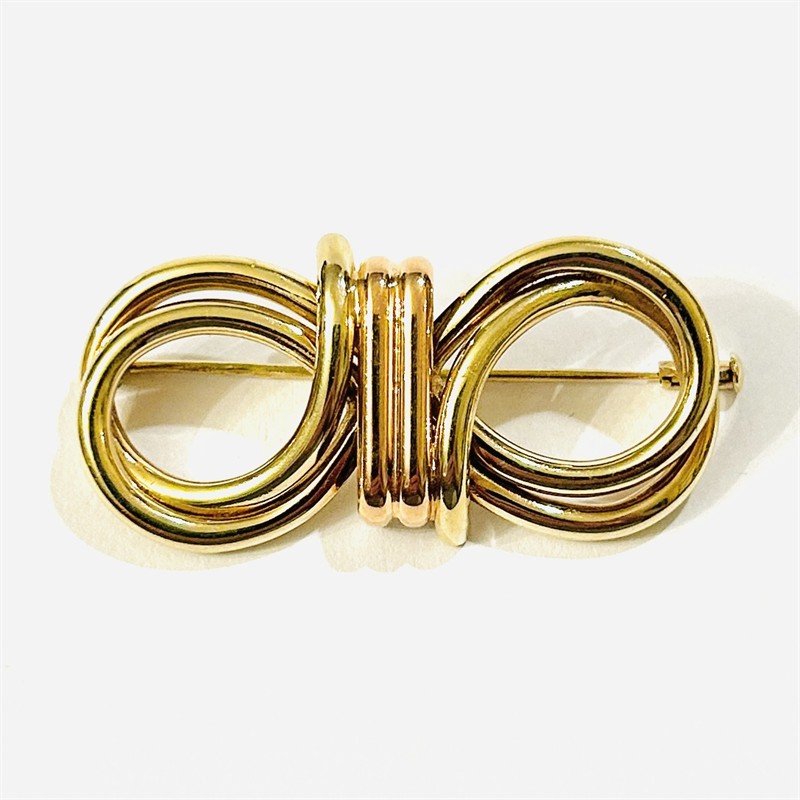 Zlatá art-deco brož "mašle"