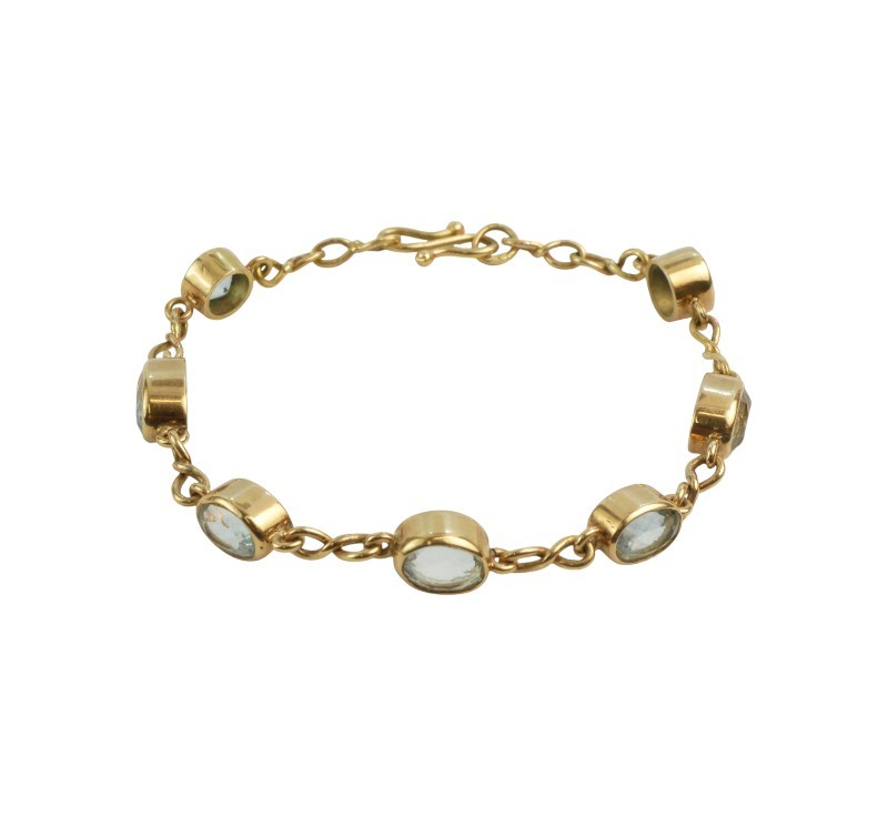 Zlatý náramek s topazy