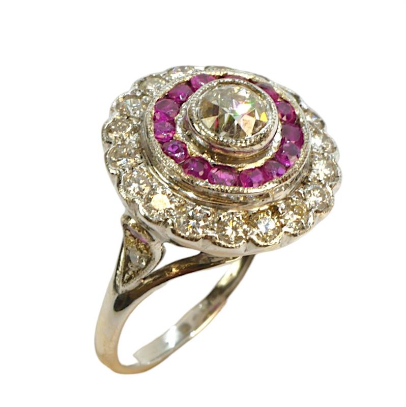 Zlatý prsten s brilianty a rubíny
