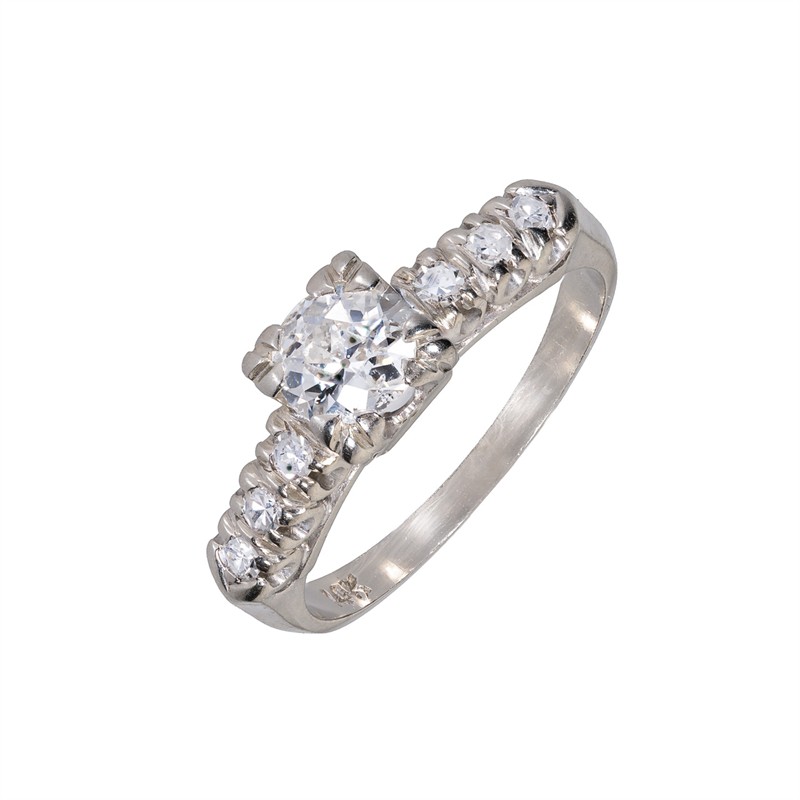 Zlatý prsten s přírodními diamanty 0,69 ct (vzácně bílé)