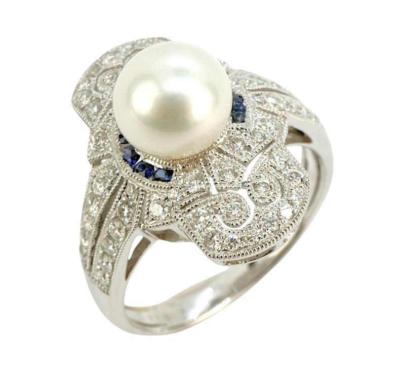 Zlatý prsten s diamanty, modrými safíry a perlou