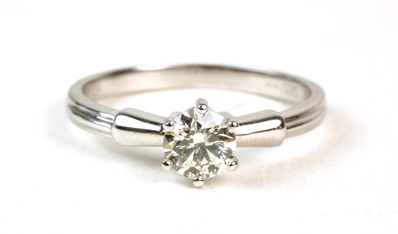 Zlatý prsten s briliantem 0,45 ct