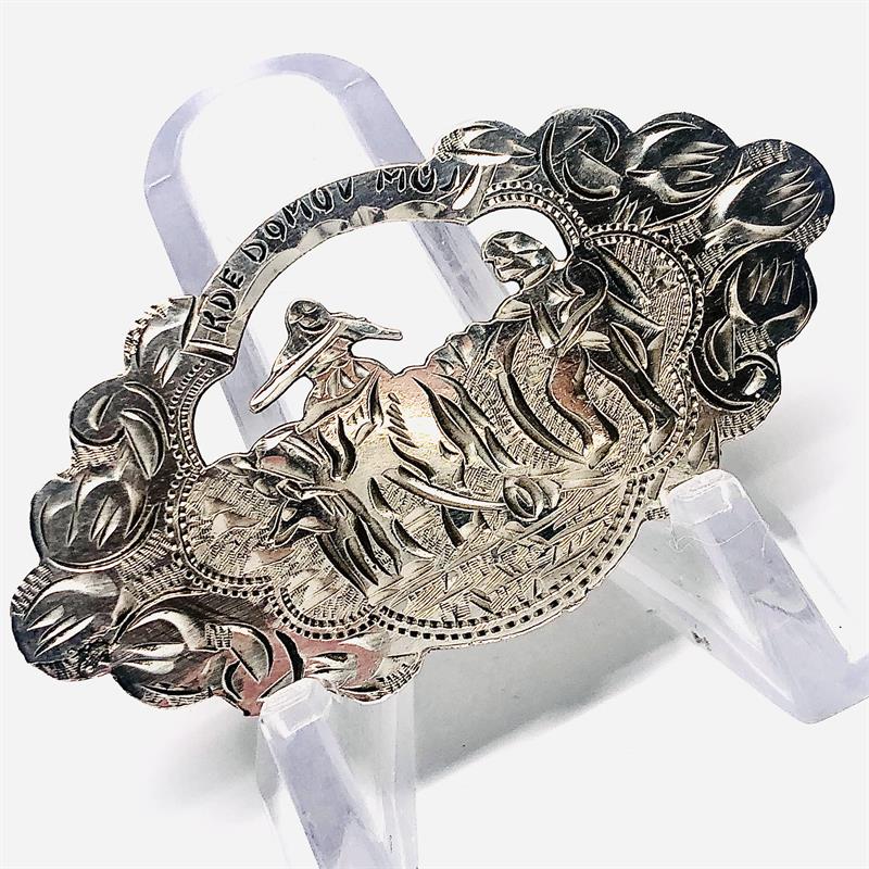 Stříbrná autorská brož