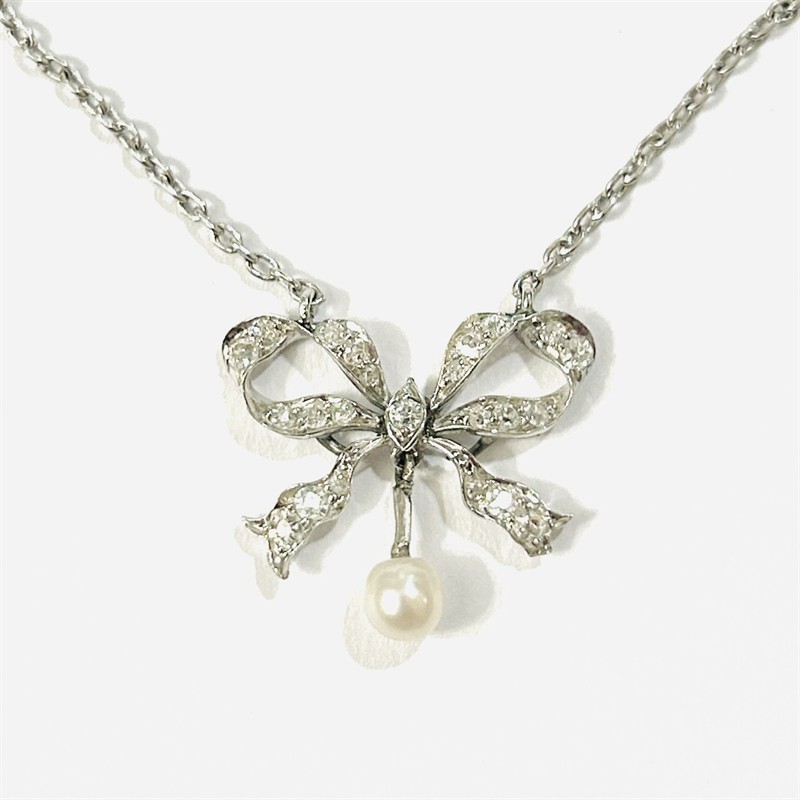 Zlato-platinový secesní koliér "mašle" s diamanty a perlou