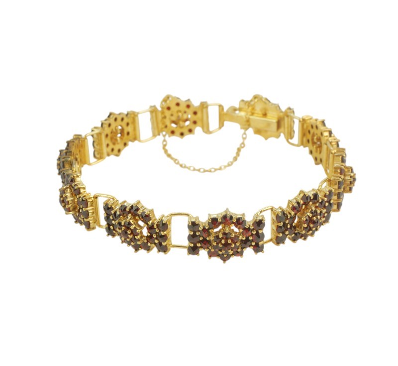 Stříbrný náramek s granáty