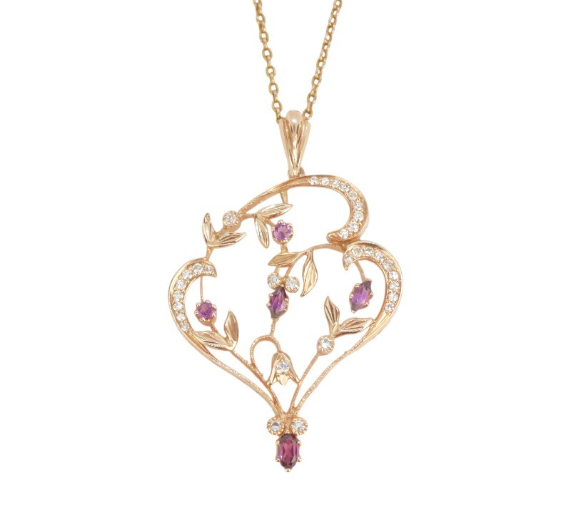 Zlatý závěs s diamanty a rhodolity