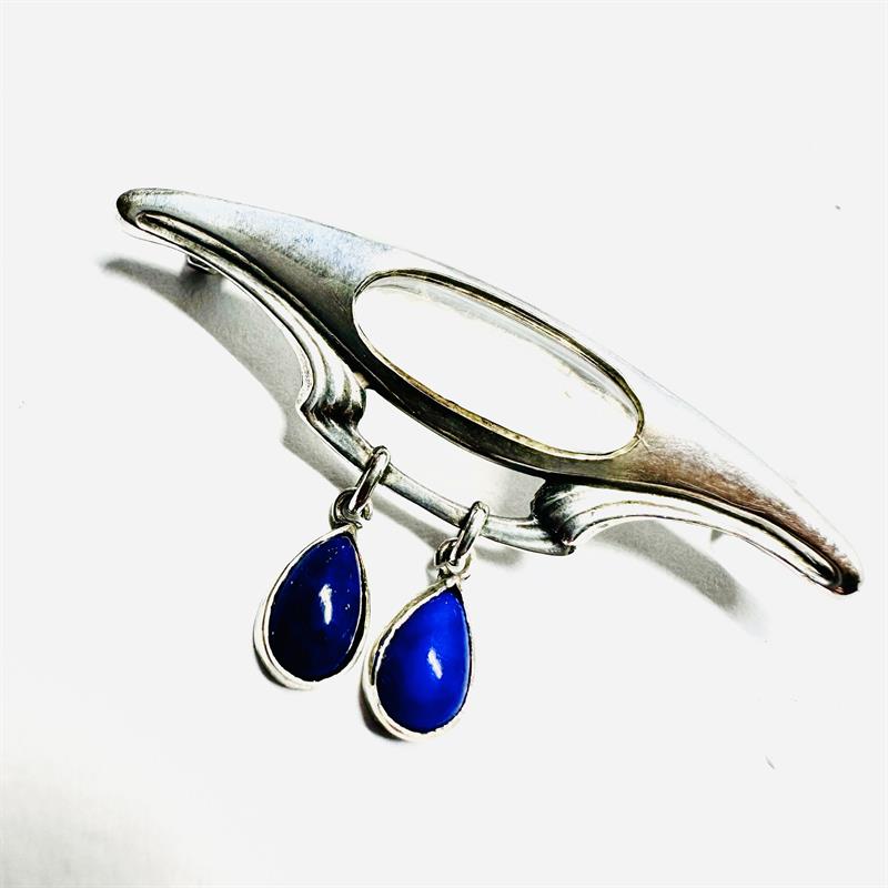 Stříbrná secesní brož s měsíčním kamenem