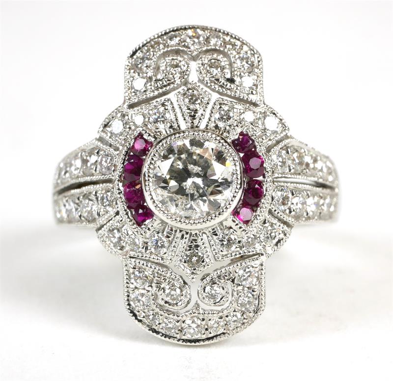 Zlatý prsten s brilianty a rubíny 1,07 ct