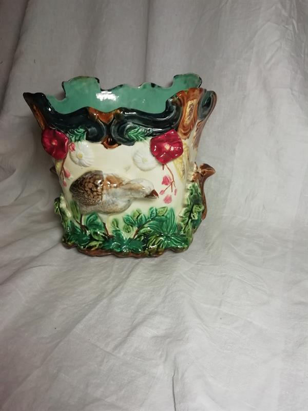 Květník s motivem ptáka